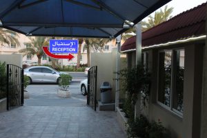 detailed gate and entrance to al kayyali medical in qatar with marked locations 