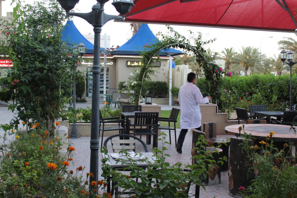 al kayyali center in qatar rose garden and natural seating area
