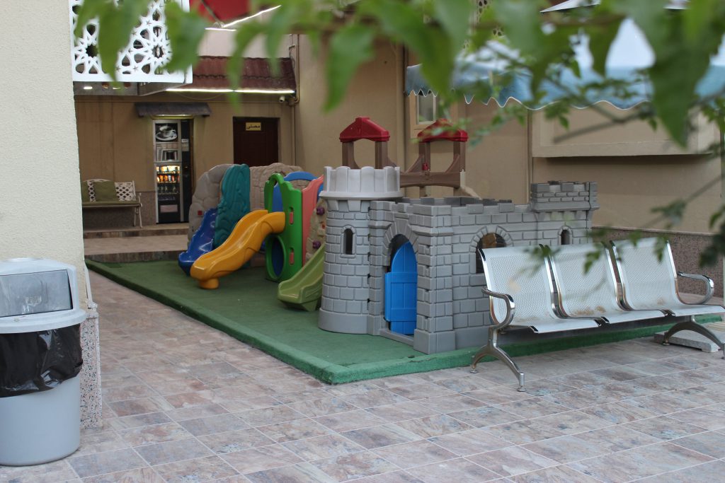 outdoor children play area at al kayyali medical in qatar