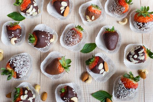 Chocolate covered strawberries and nuts.