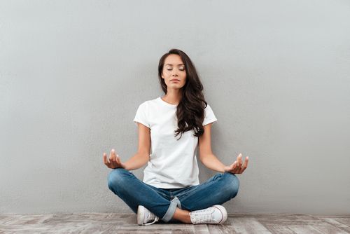 Woman meditating for relaxation.