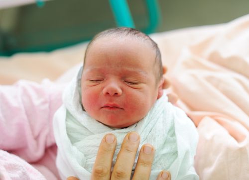 Adorable Asian baby born. 