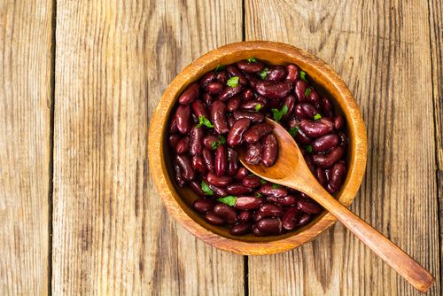A bowl of cooked red kidney beans.