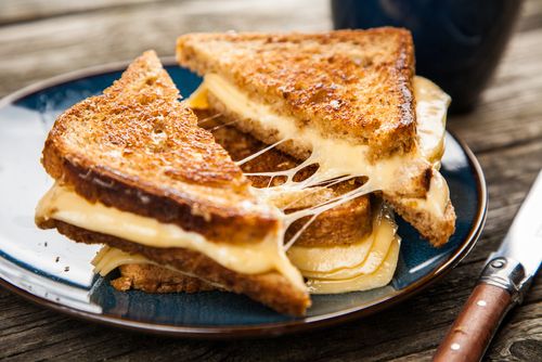 Food photography of a delicious grilled cheese sandwich. 