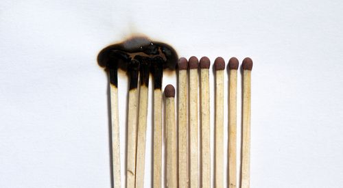Image of matchsticks depicting social distancing.